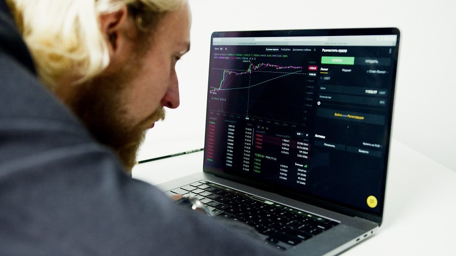 Recruiter reviewing candidates on a laptop